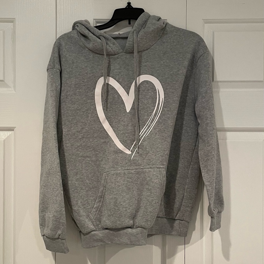 gray hoodie with white heart